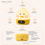 Infographie des fonctionnalités et boutons de réglage de la veilleuse réveil Canneton Nox et Dies : affichage température, veilleuse douce lumière, réveil intelligent, options d'éclairage, fonction sommeil, horloge réveil indépendante